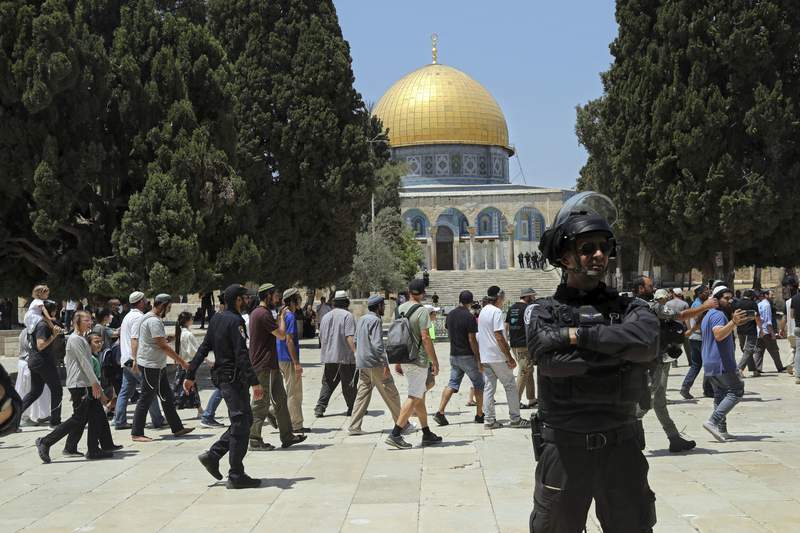 Hundreds of Jews visit contested holy site in Jerusalem