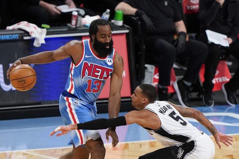 Harden returns, comes off Nets' bench against Spurs