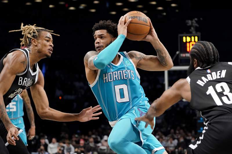 Hornets pull away, beat Nets 111-95 for first 3-0 start