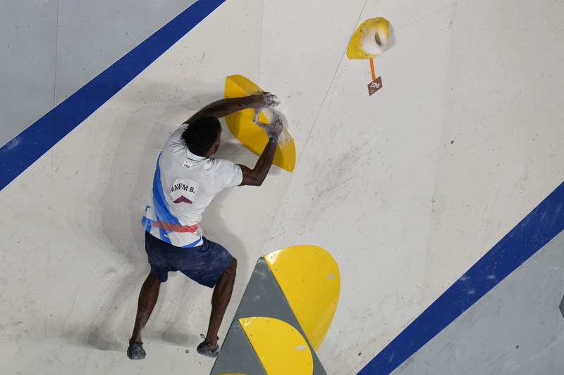Olympics Latest: Mawen qualifies 1st in sport climbing