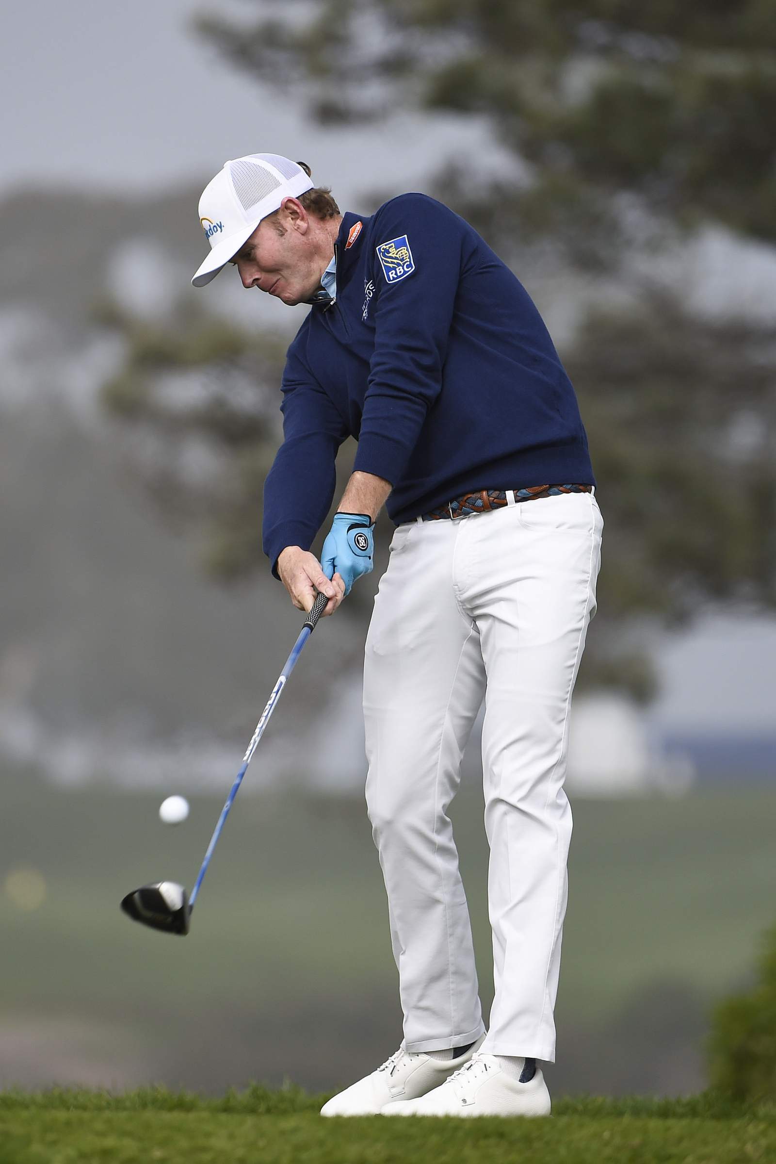 Rahm takes the lead at Torrey Pines with McIlroy lurking