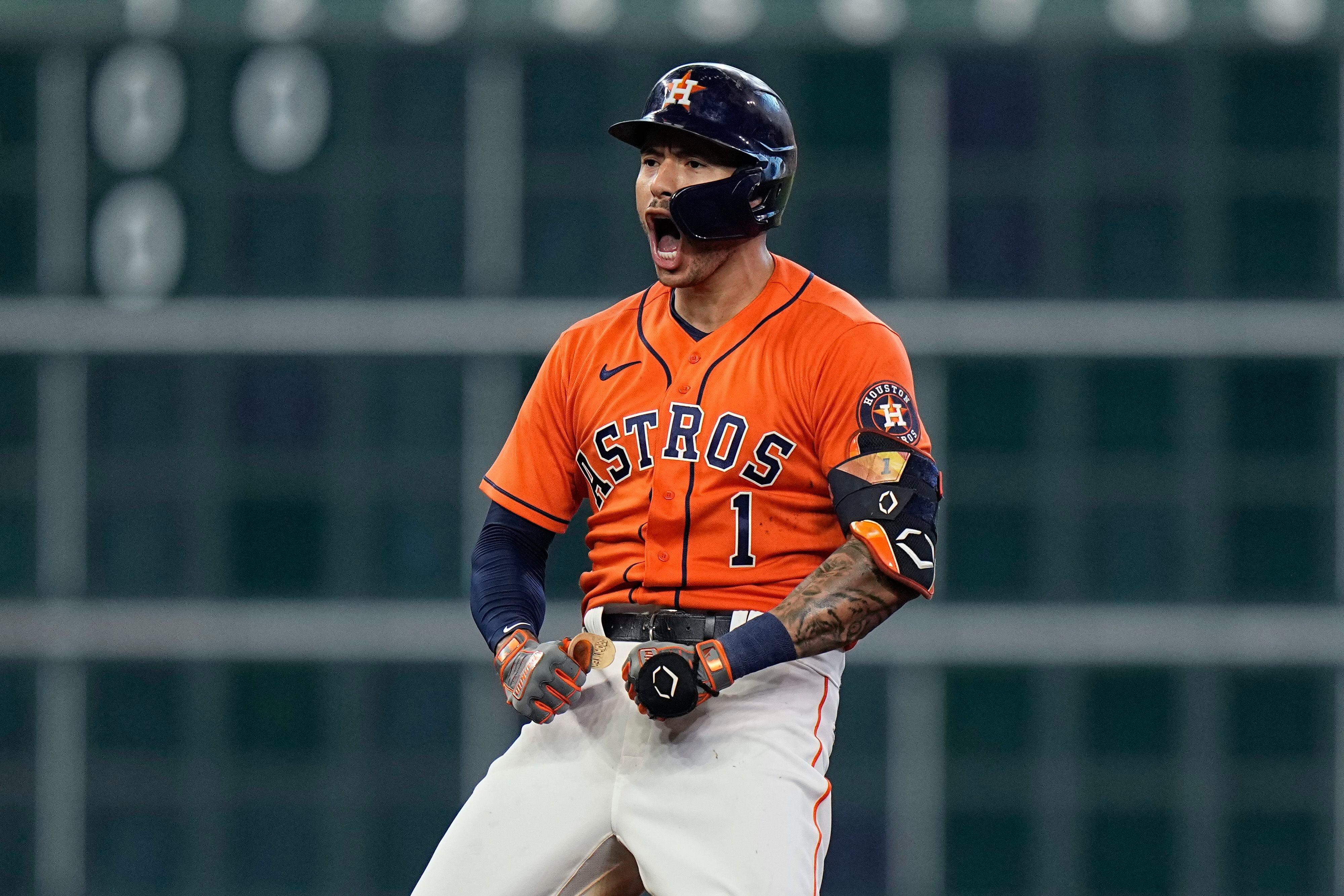 Correa, Alvarez help Astros take 2-0 lead over Sox in ALDS