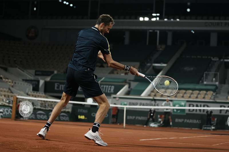 The Latest: Medvedev tops Paul to make 3rd Rd debut in Paris