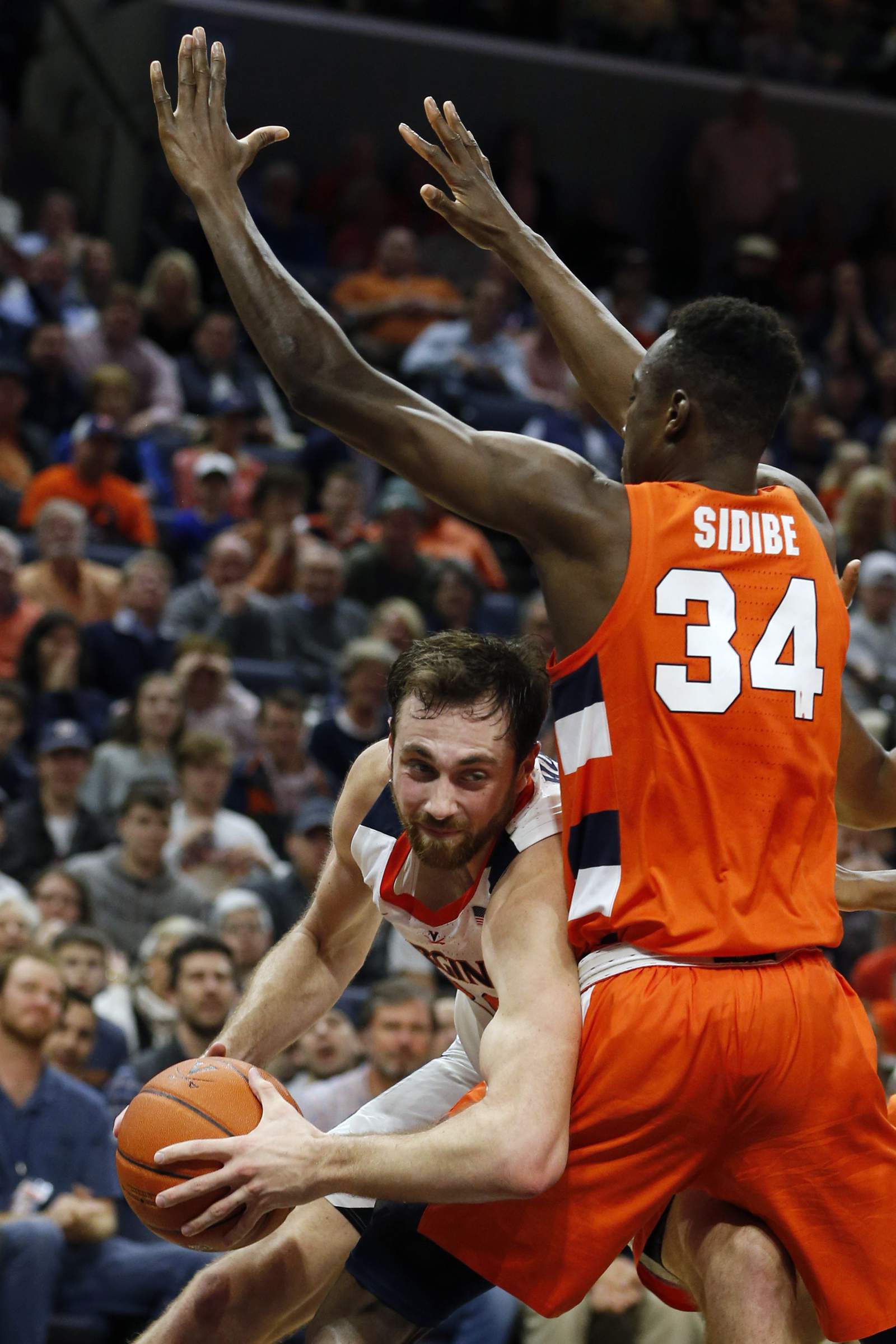 Boeheim lifts Syracuse past No. 18 Virginia, 63-55 in OT