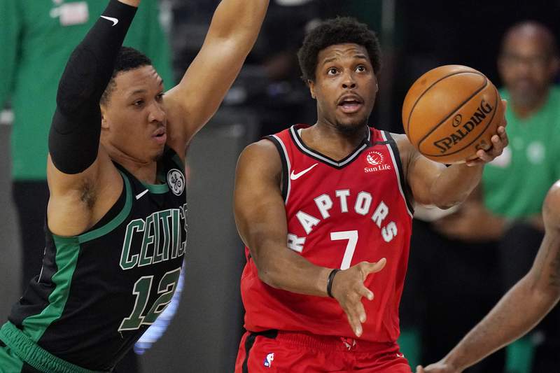 Heat to acquire guard Kyle Lowry from Toronto