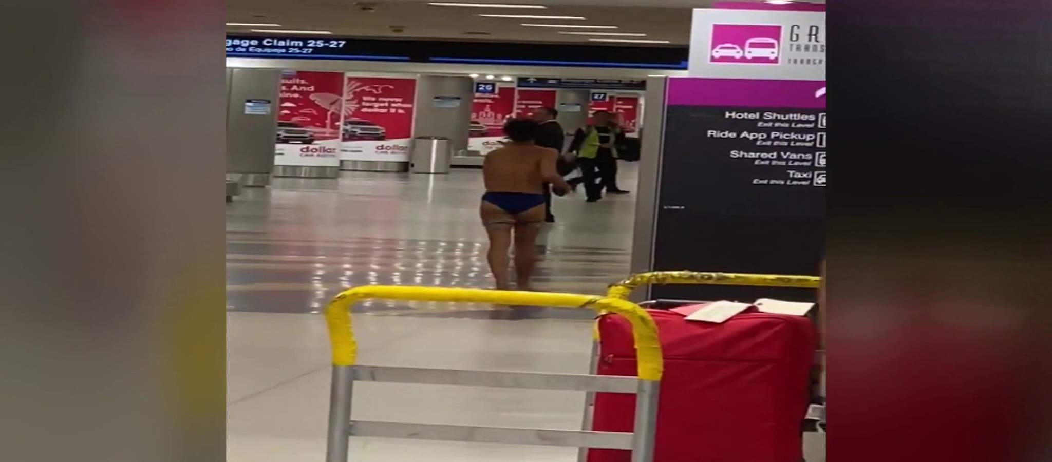 Naked Woman Wanders Miami Airport And Jumps On Police Car 