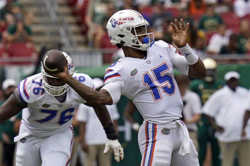 QB debate continues as No. 13 Florida routs USF 42-20