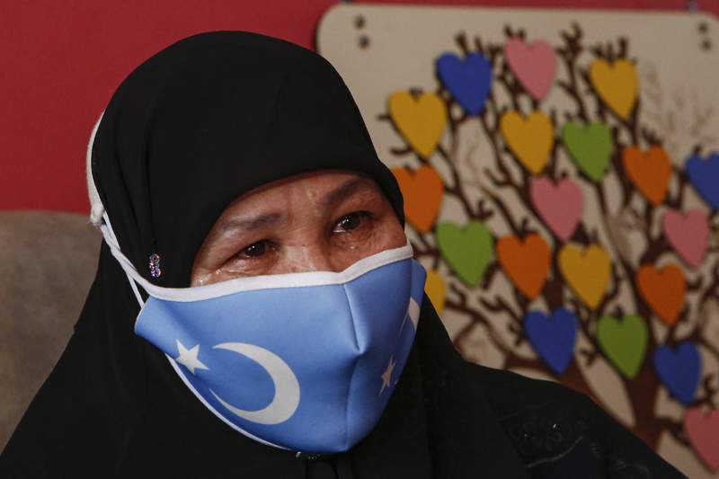 Uyghur exiles describe forced abortions, torture in Xinjiang
