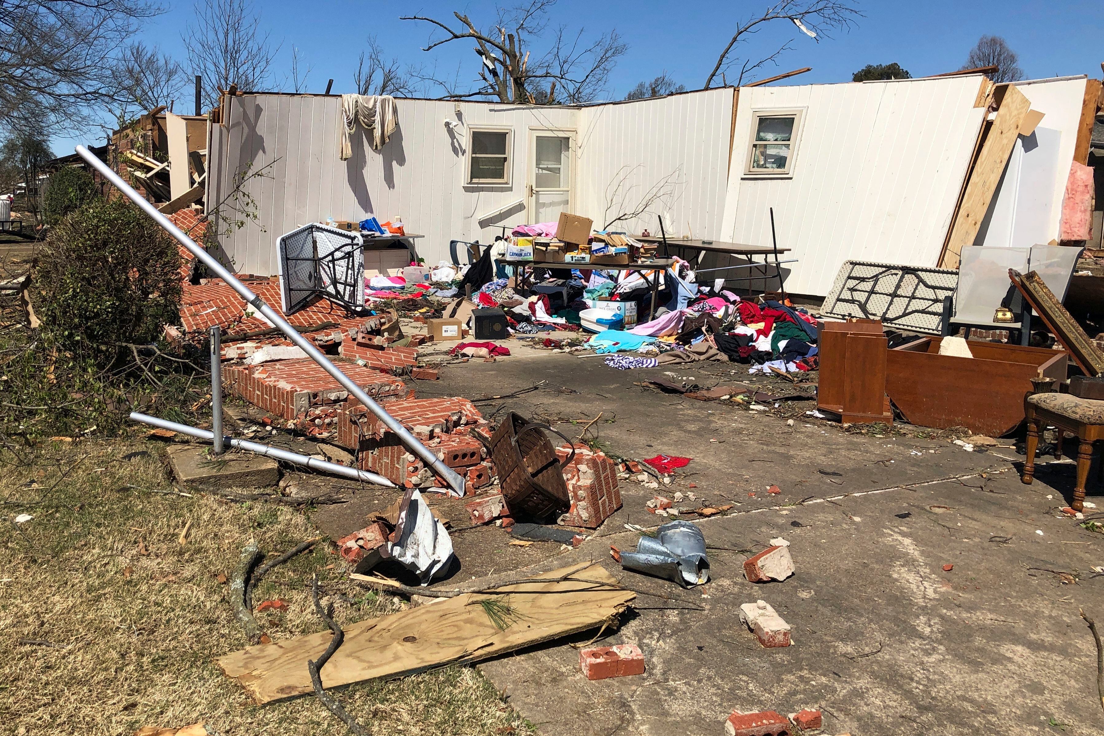 Tornado survivors recount flying debris, destroyed buildings