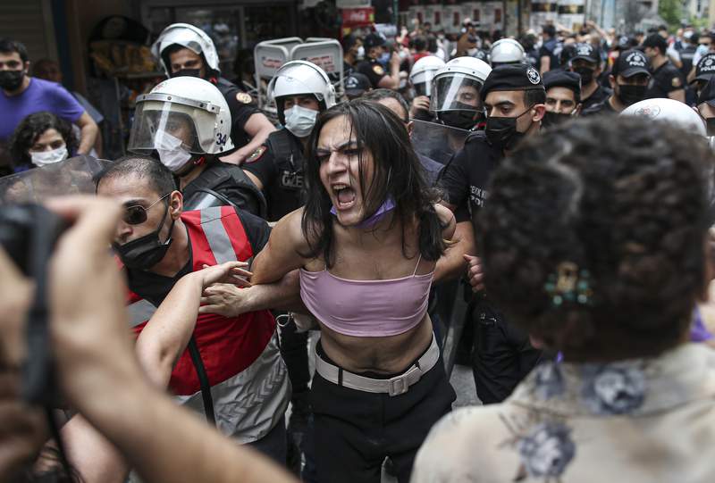 Big Pride parade in Paris; Turkish police stop marchers