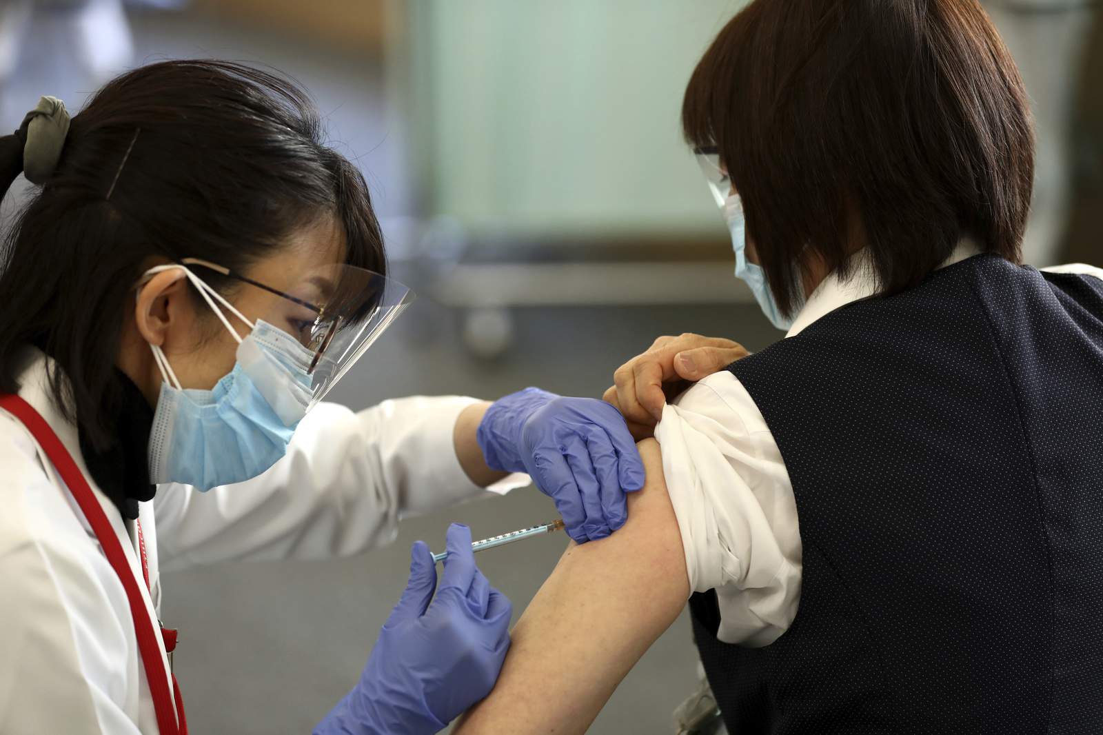 Japan starts COVID-19 vaccinations with eye on Olympics