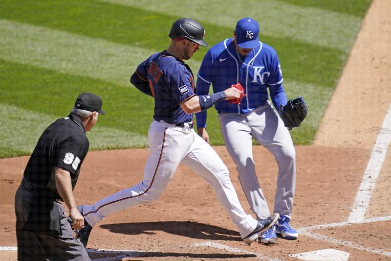 Rookie Larnach homers, Twins hang on to beat Royals 6-5