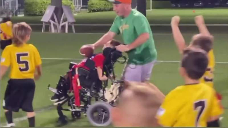 Video shows opposing football teams cheering 9-year-old wheelchair user’s touchdown