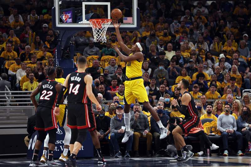 Brissett helps Pacers pull away from Heat in overtime