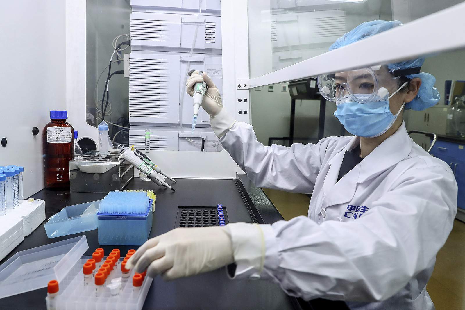 China firm uses workers to 'pre-test' vaccine in global race