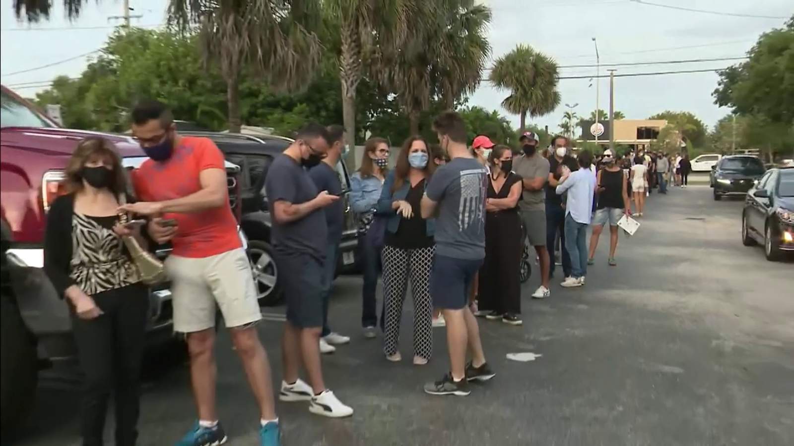 People line up hours early at FEMA-sponsored pop-up site for one-dose vaccine in NW Miami-Dade