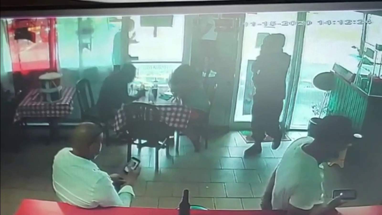 WATCH: Surveillance video shows Northwest Miami-Dade restaurant owner tackling gunman