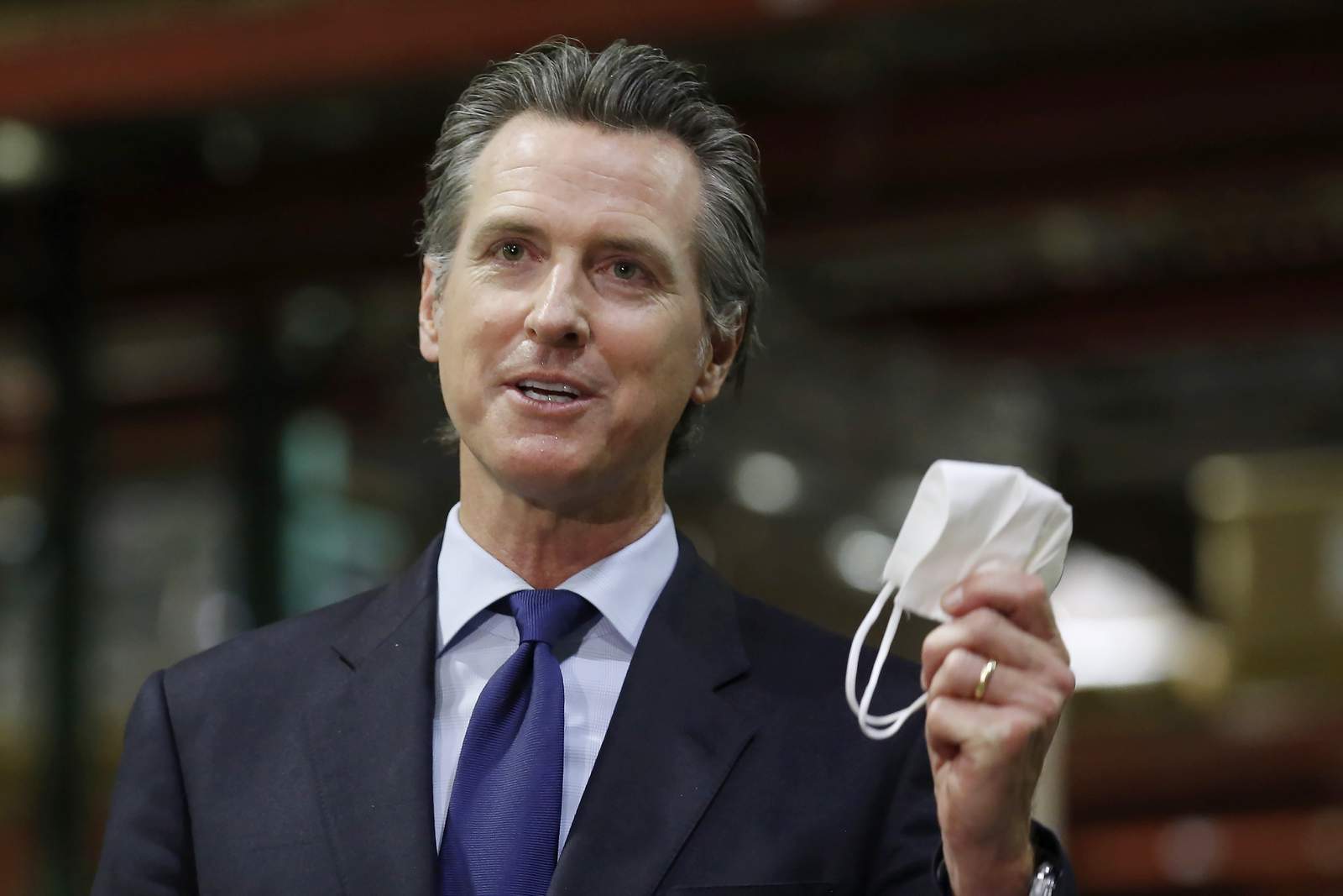 The Latest: California governor tests negative for virus