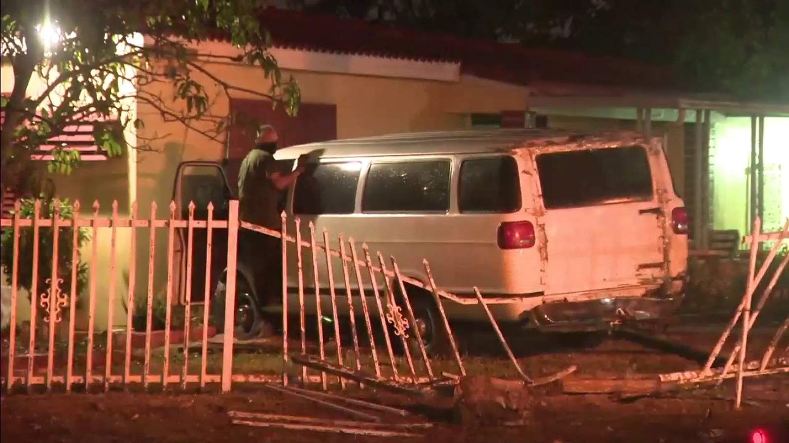 Collision causes van to slam into bedroom wall of house in NW Miami-Dade