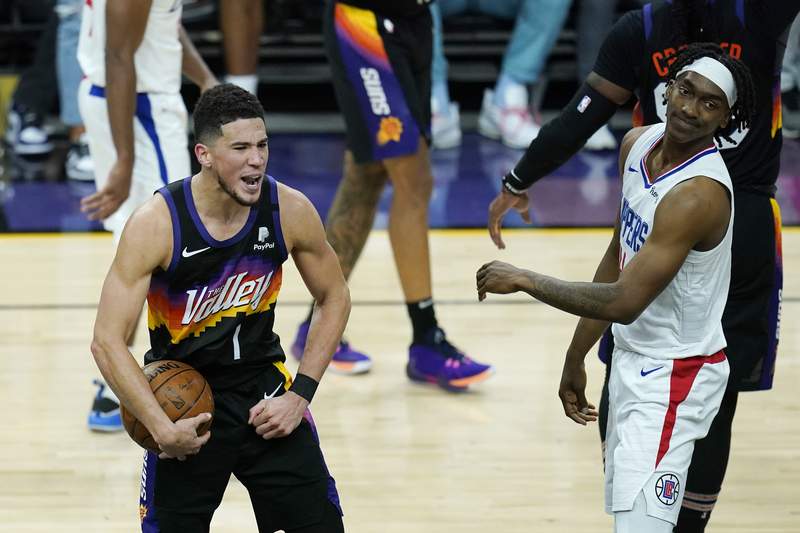 Booker has first triple-double, Suns beat Clippers 120-114