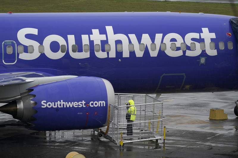 Woman charged with assaulting Southwest flight attendant