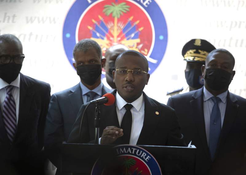 Official: Haiti’s interim prime minister to step down
