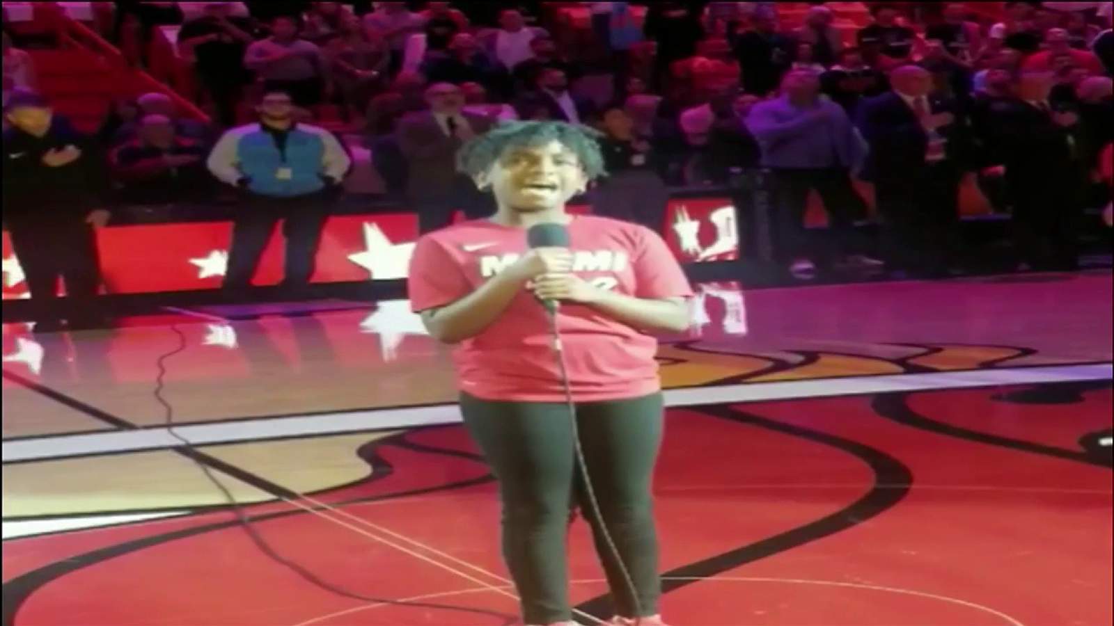 11-year-old basking in anthem performance at Wade ceremony