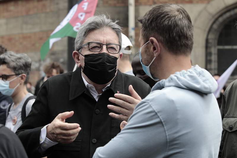 French far-left chief floured in march against far right