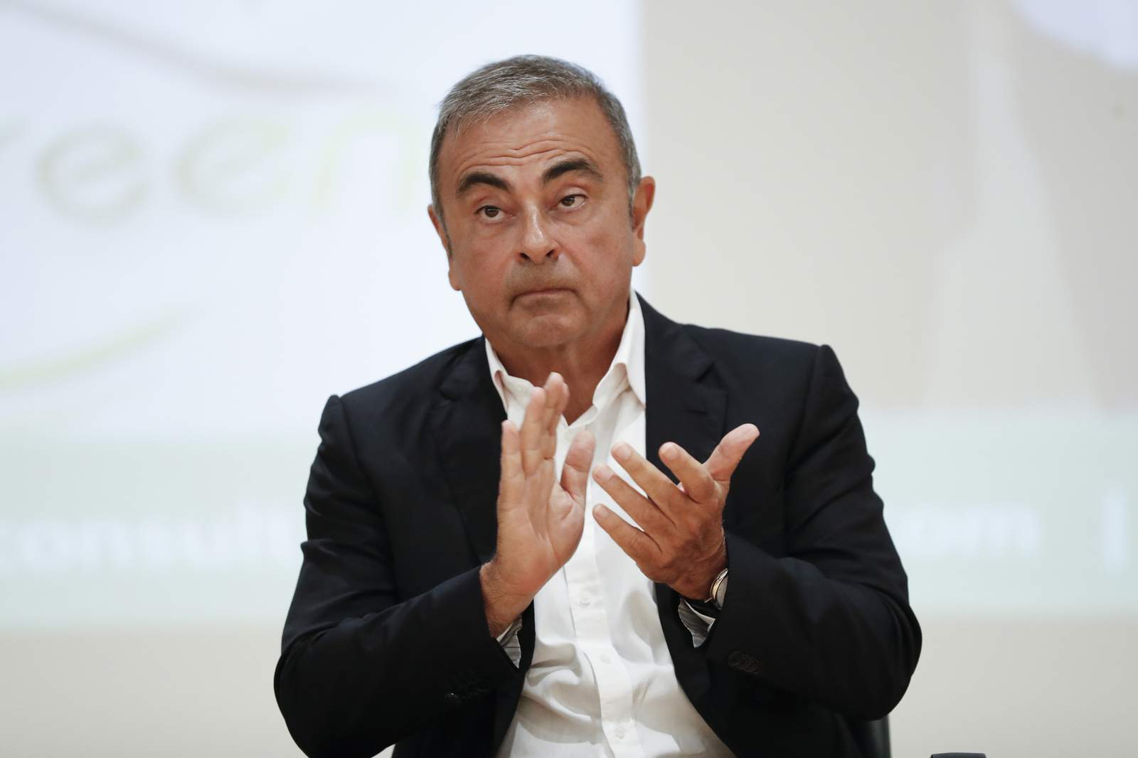 Nissan's damages case against absent Ghosn opens in Japan