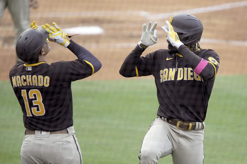 Padres rally from late 6-run deficit, beat Dodgers 8-7 in 11