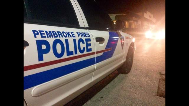 Police: Woman dies after being trapped under car in Pembroke Pines