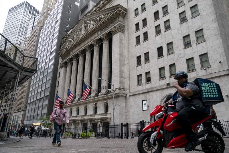 Stocks end mixed on Wall Street, still notch weekly gains