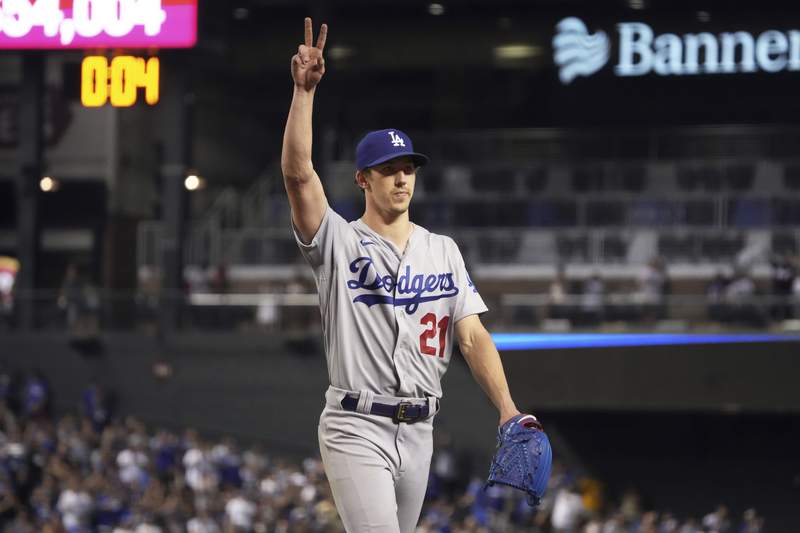 Buehler takes no-hitter into 8th, Dodgers beat D-backs 9-3