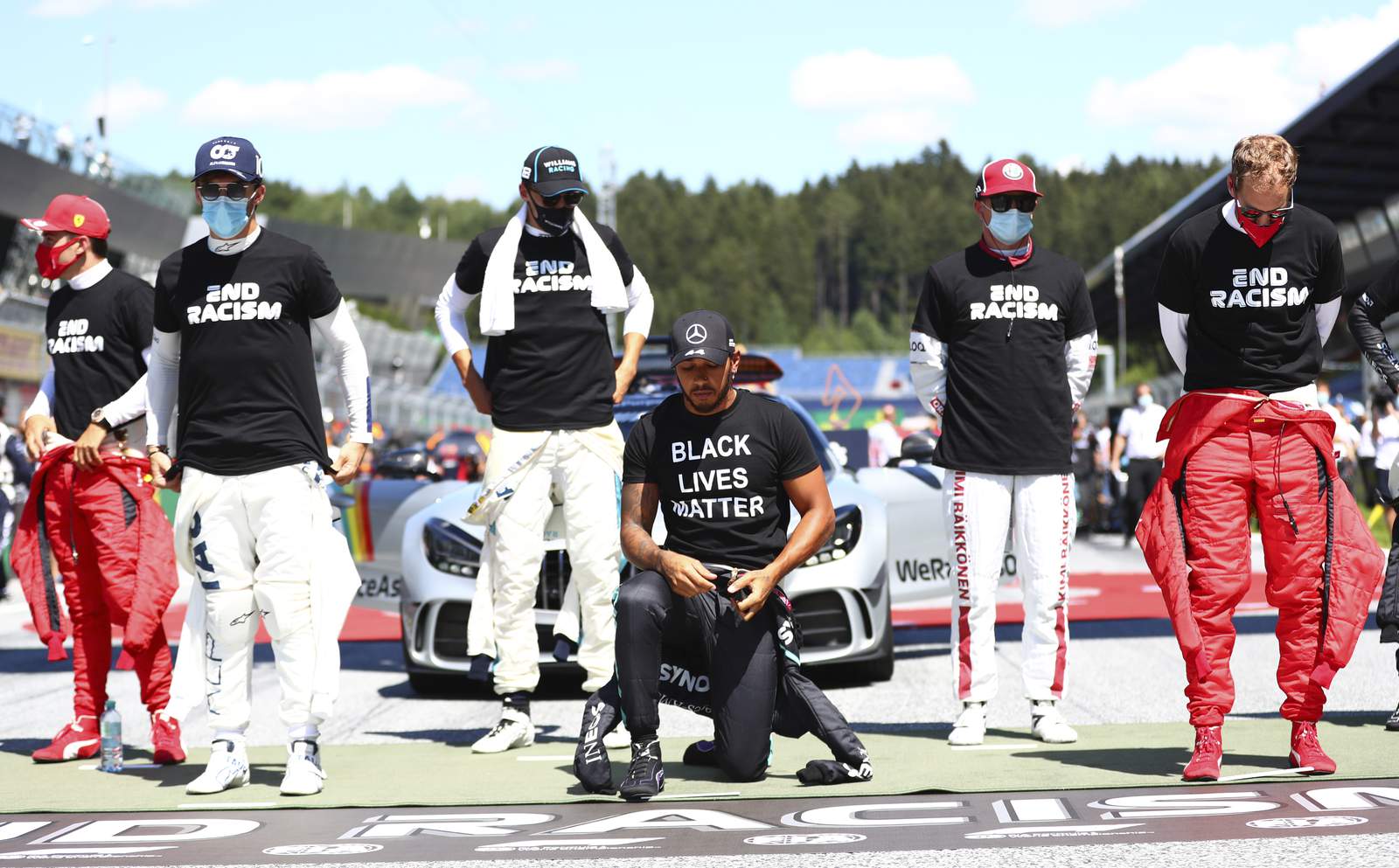 F1 Drivers all wear "End Racism" T-shirts, but 6 don't kneel