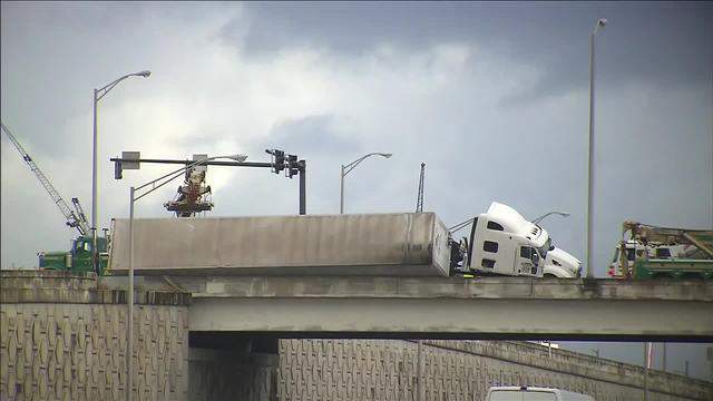 Tow Truck Driver Falls To His Death After Tractor Trailer