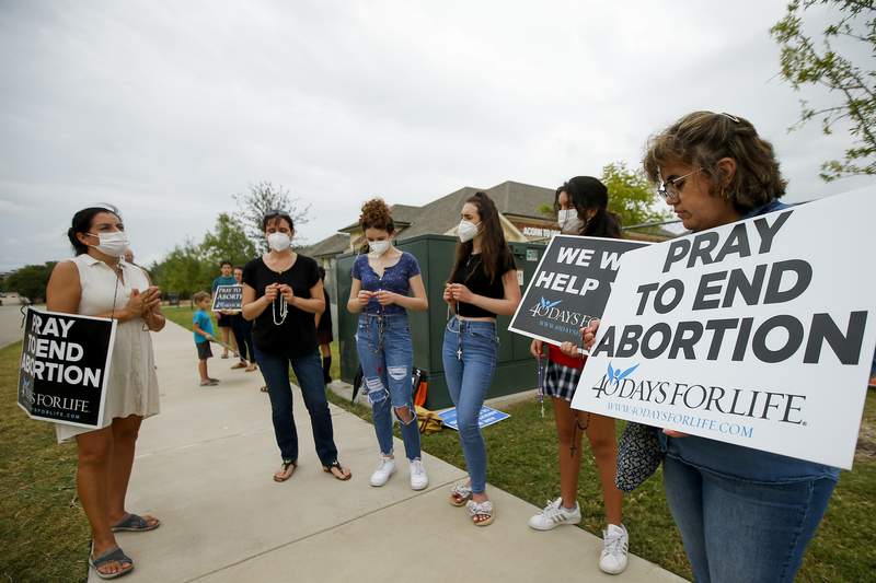 Texas abortion law foes target lawmakers' corporate donors