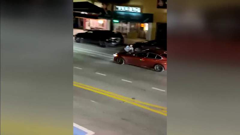BMW owner jumps onto moving car after woman steals it from Las Olas Boulevard