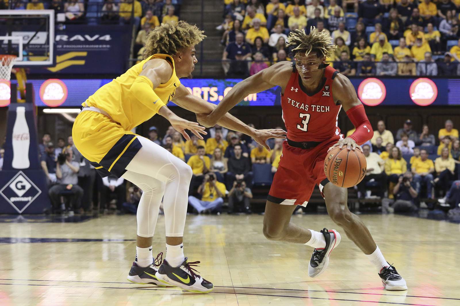 McBride leads No. 17 West Virginia over No. 22 Texas Tech