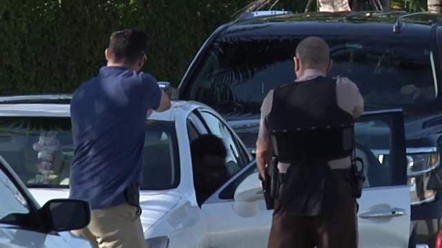 Police take down suspect found sitting in Lexus stolen during carjacking