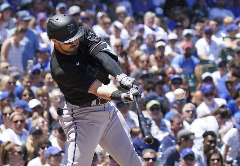 Duvall smacks 2 HRs again as Marlins pound Cubs 11-1