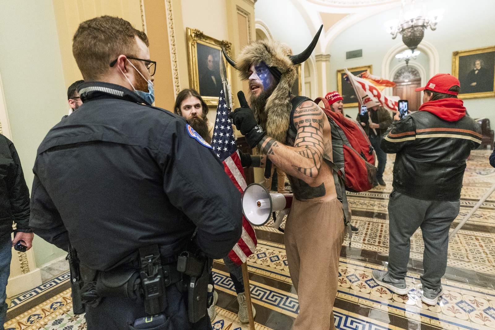 More arrests in Capitol riot as more video reveals brutality