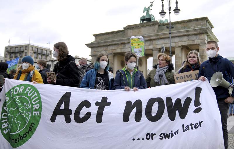 Campaigners stage climate protests across continents