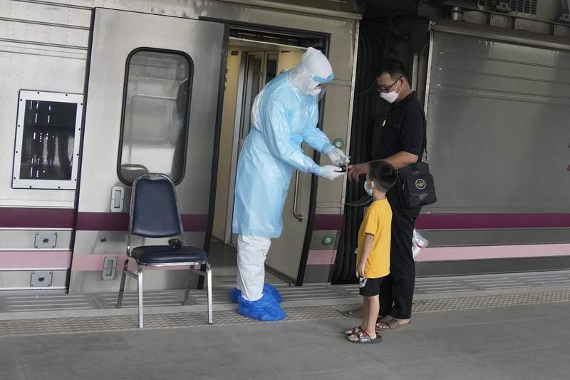 Thailand sends COVID-19 patients to hometowns by train