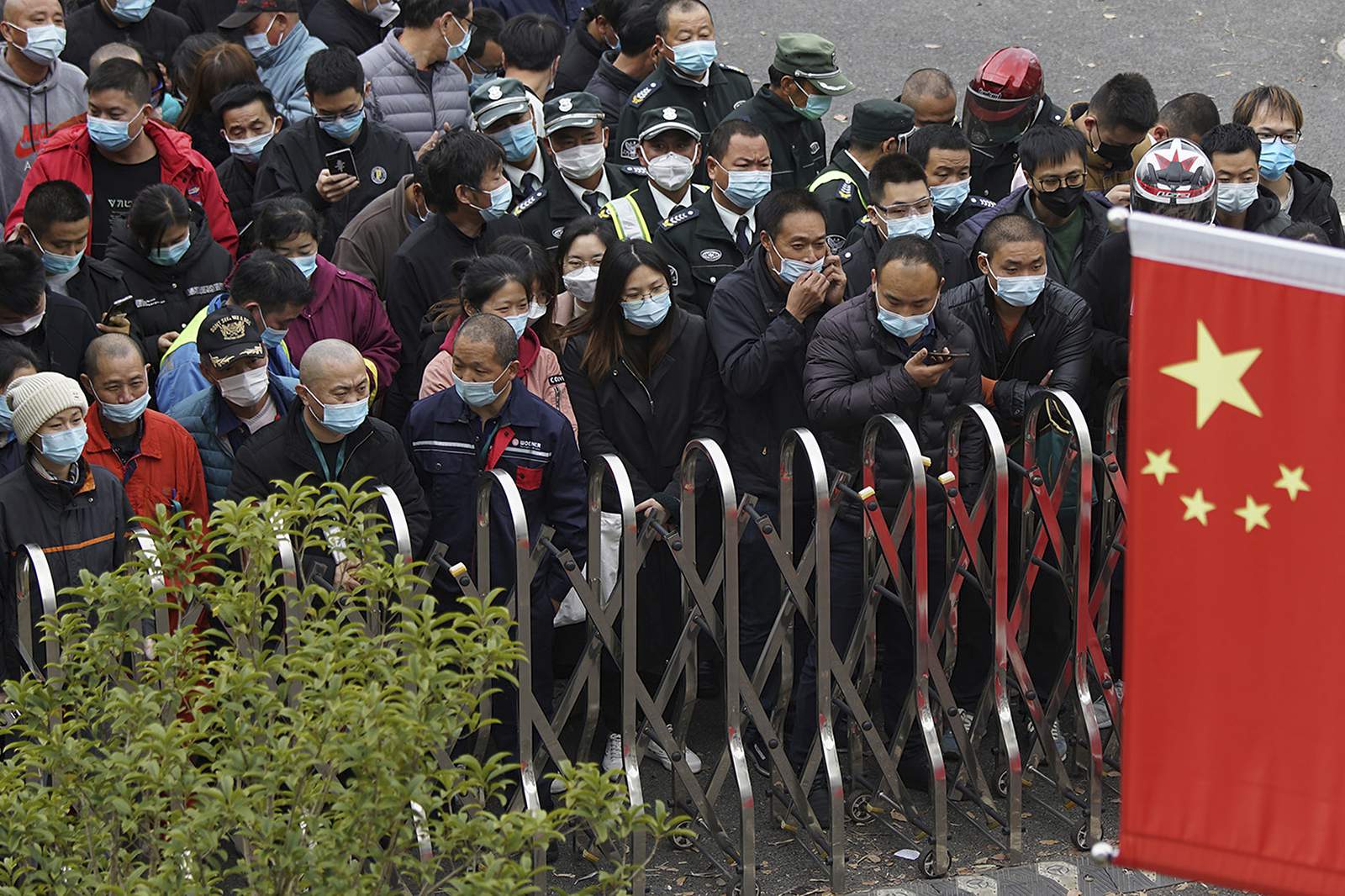 China tests millions after coronavirus flare-ups in 3 cities