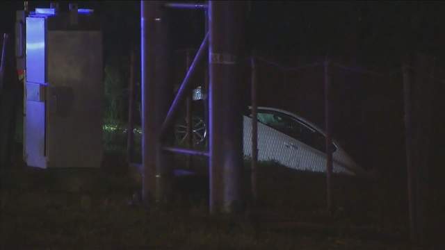 Vehicle Crashes Into Canal Along I 95