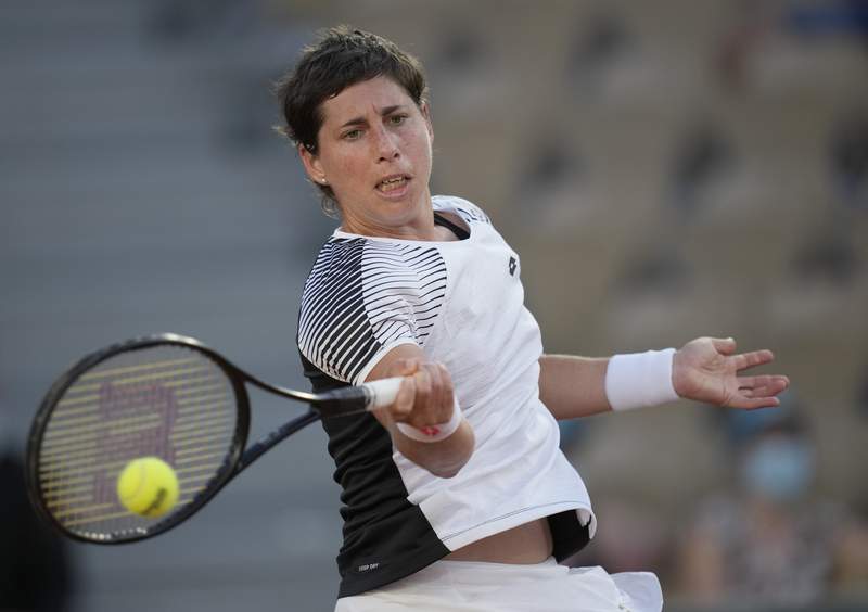 The Latest: Spanish player back at French Open after cancer