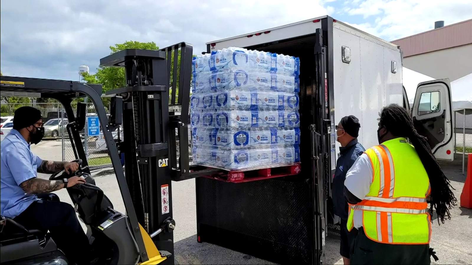 Transport Workers Union members, American Airlines ship water to Texans in need