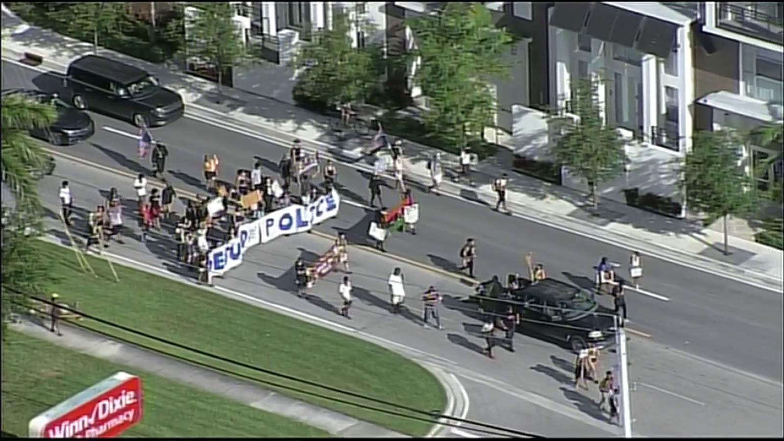 Protesters march to Miami-Dade State Attorneys office