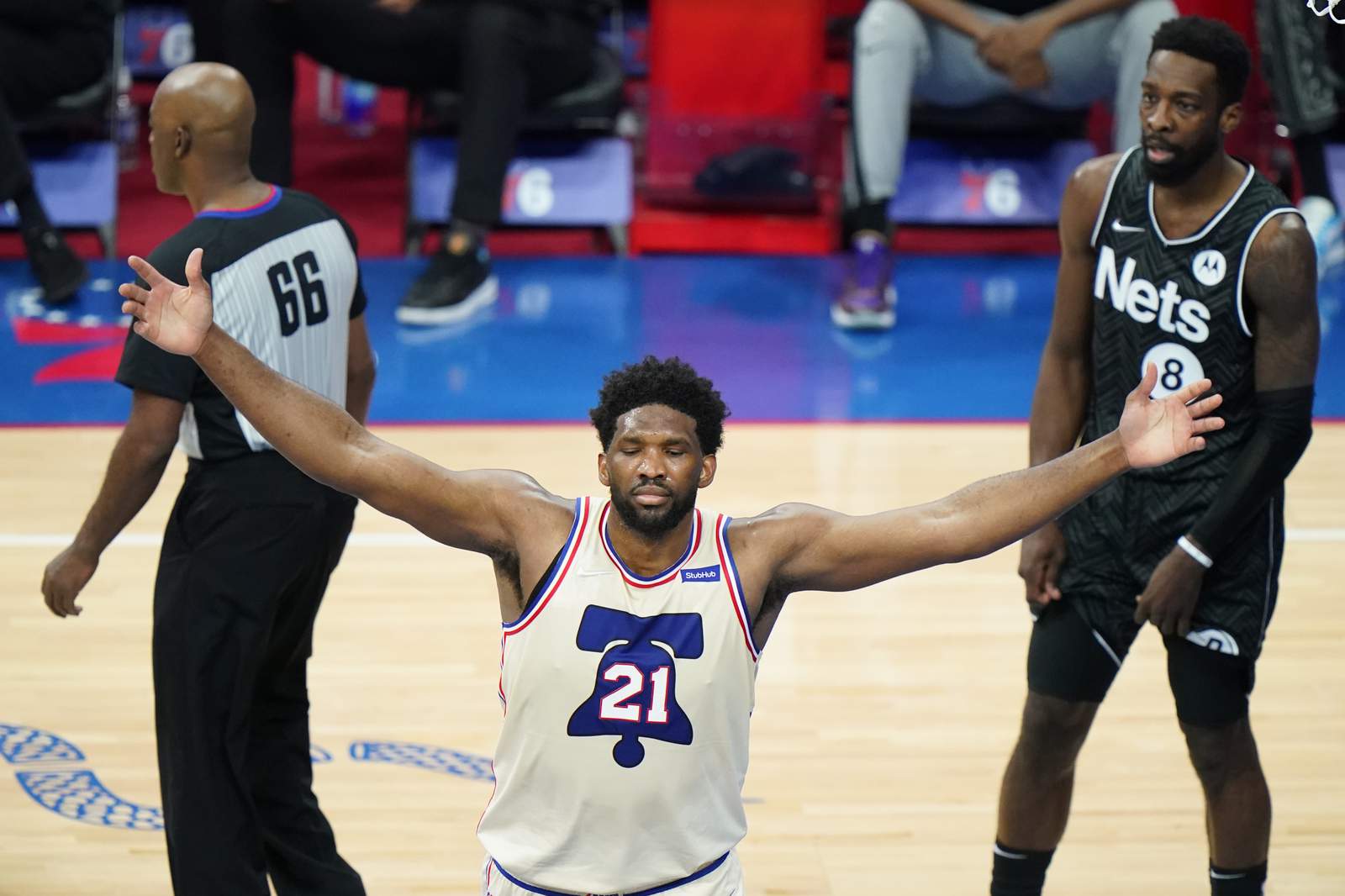 Embiid, 76ers top undermanned Nets 123-117 for 1st in East