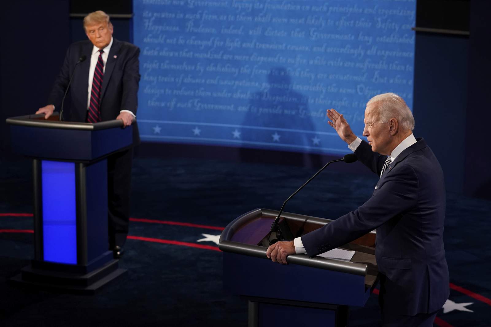 The Latest: Trump casts election doubts, Biden urges voting